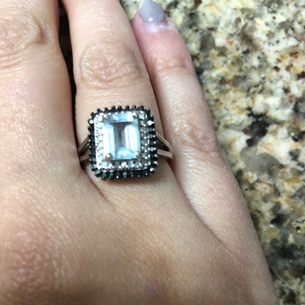 Genuine aquamarine with black and white diamonds!